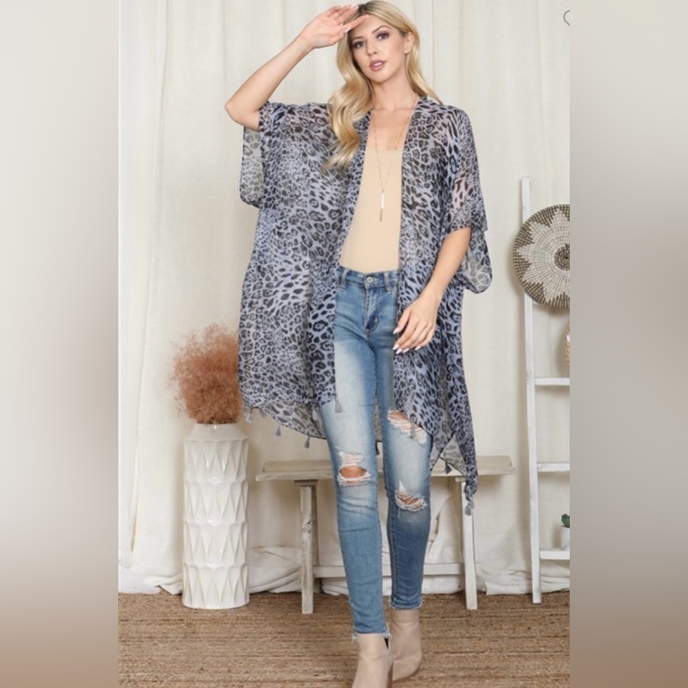 Mid length , short sleeve cardigan, lightweight